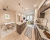 Efficient appliances, florescent recessed lighting, Milgard low E vinyl windows, high ceilings, hardwood floors