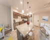 Efficient appliances, florescent recessed lighting, Milgard low E vinyl windows, high ceilings, hardwood floors